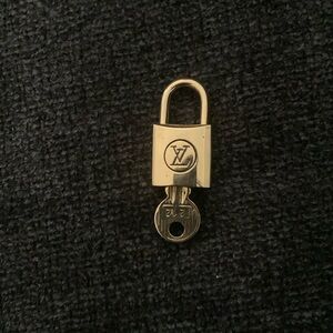 Authentic Louis Vuitton lock and key #212.